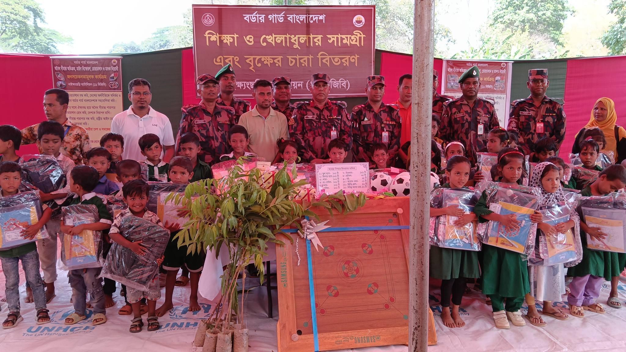 নাইক্ষ্যংছড়িতে ১১ বিজিবির ফ্রি চিকিৎসা ও শিক্ষা উপকরণ বিতরণ